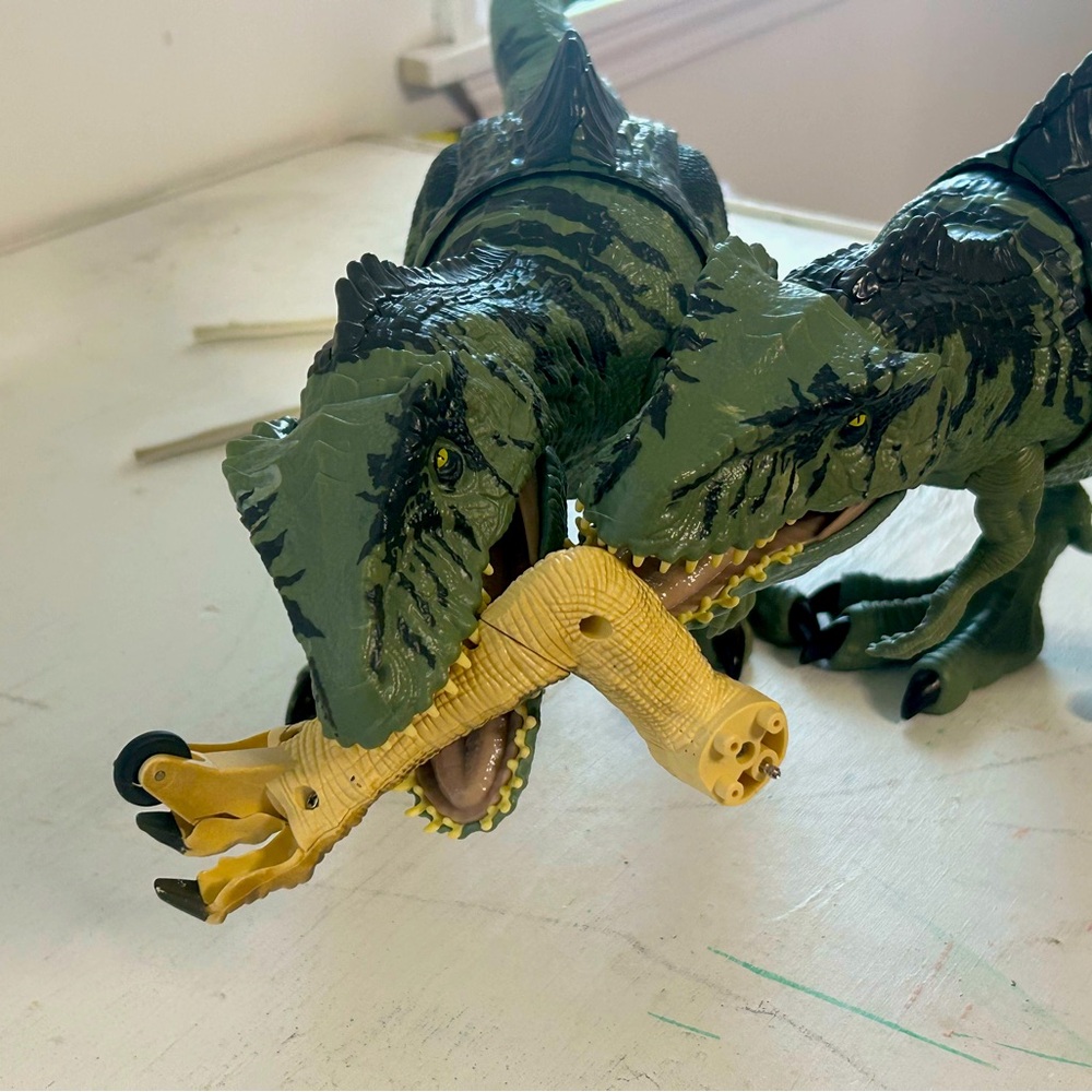 Two Gigantosaurus dinosaurs practically brand new. No packaging.